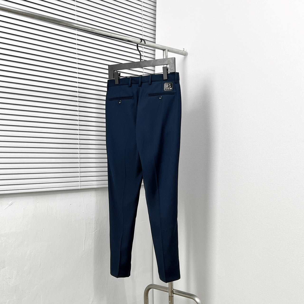 Dark blue trousers