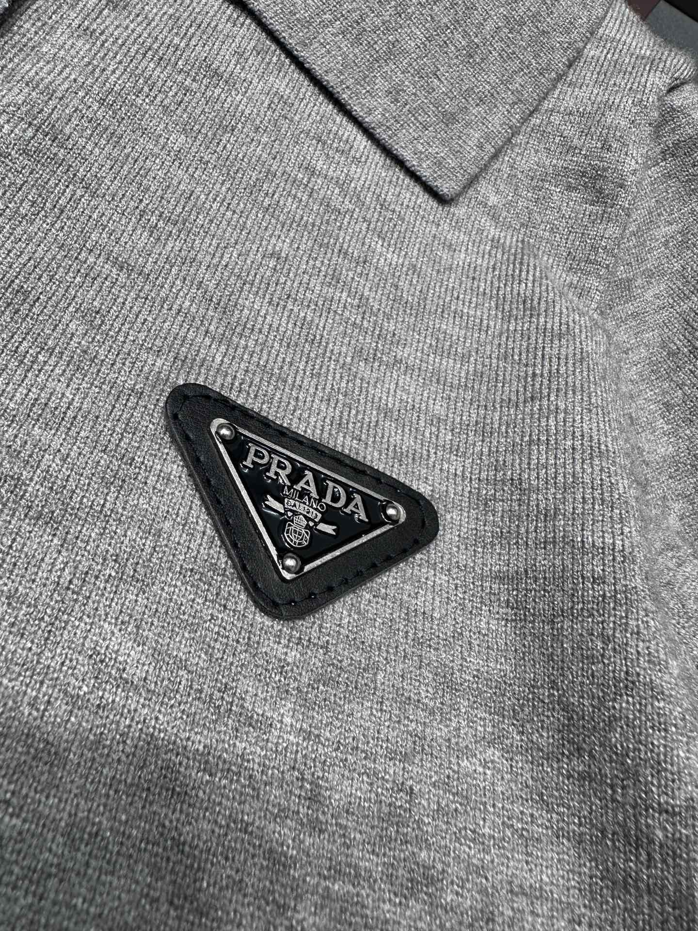 Triangle logo polo collar hem jacquard long-sleeved sweater