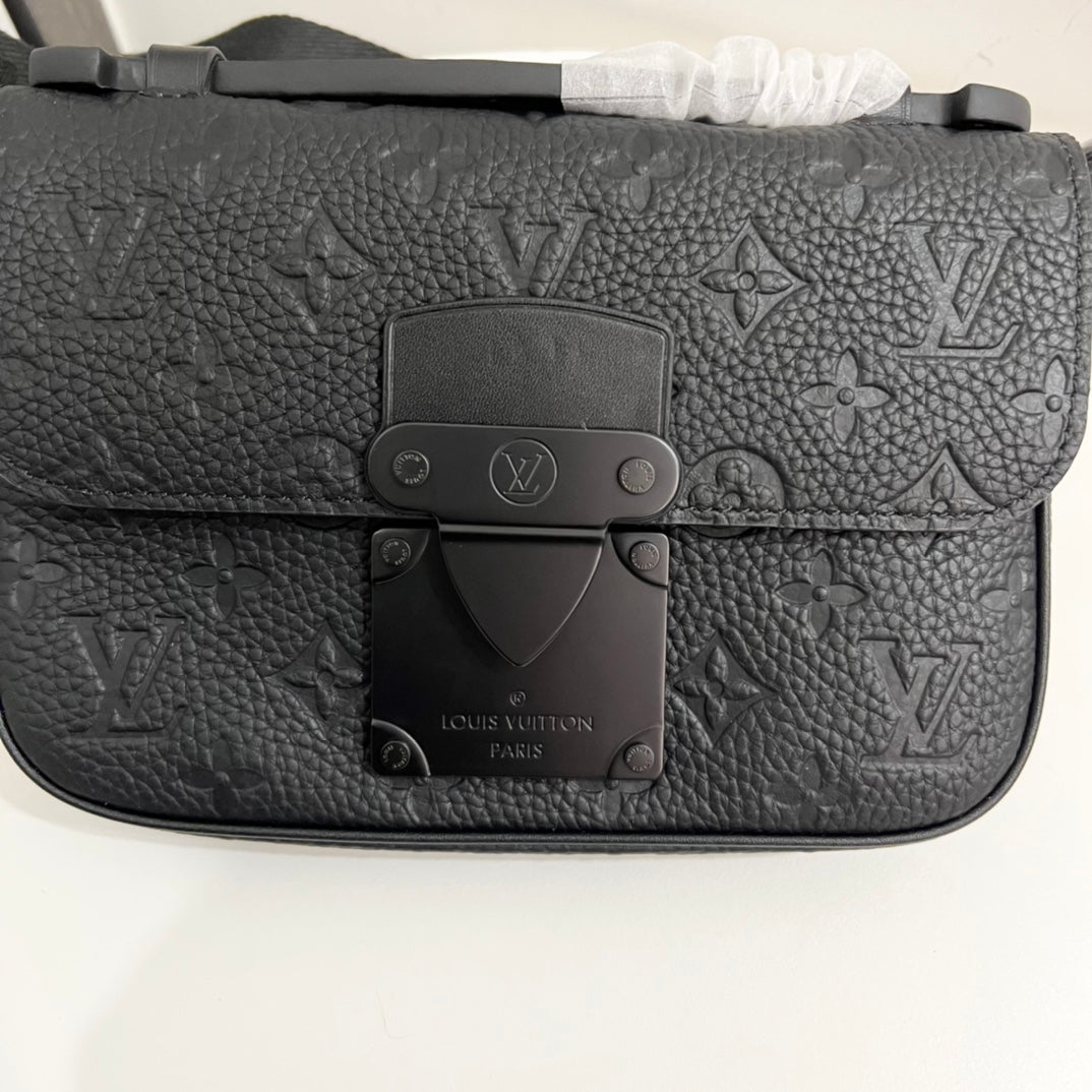 Embossed black chest bag