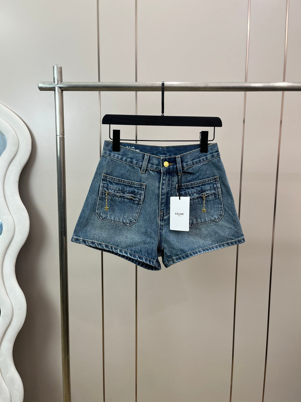 Washed mid-rise denim shorts