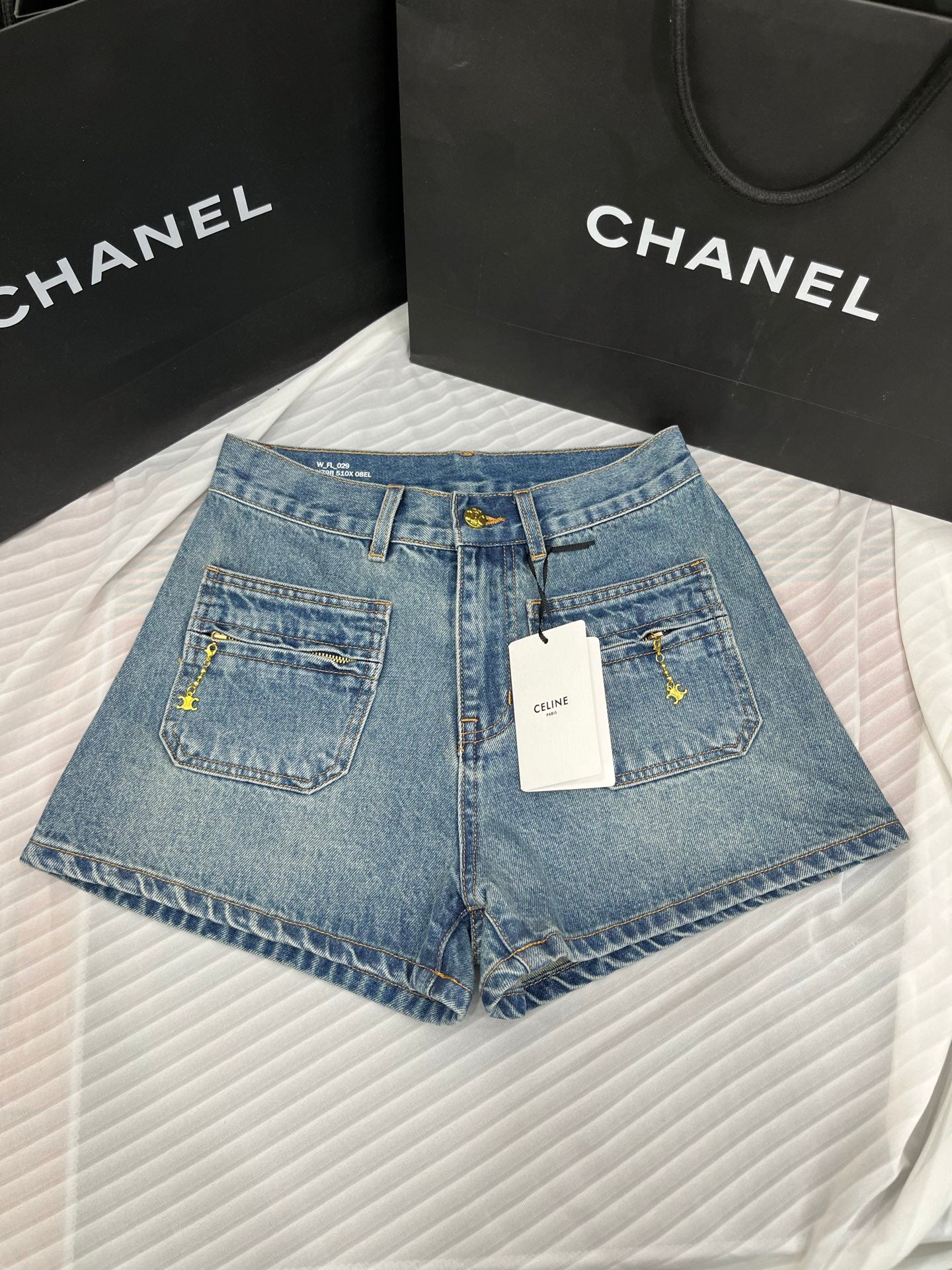 Washed mid-rise denim shorts