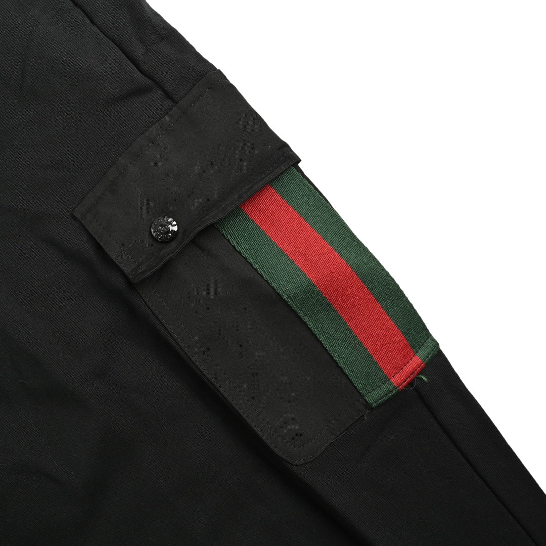 Cargo trousers with side webbing pockets