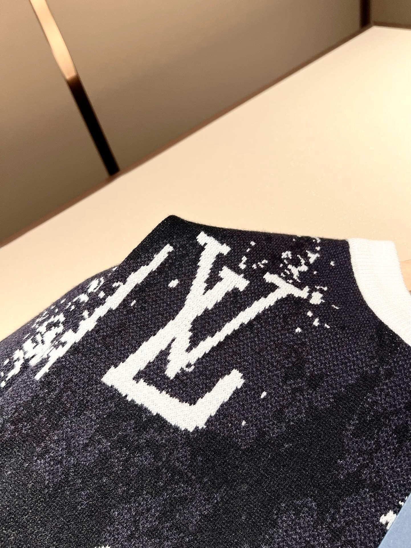 all over logo knitted sweater