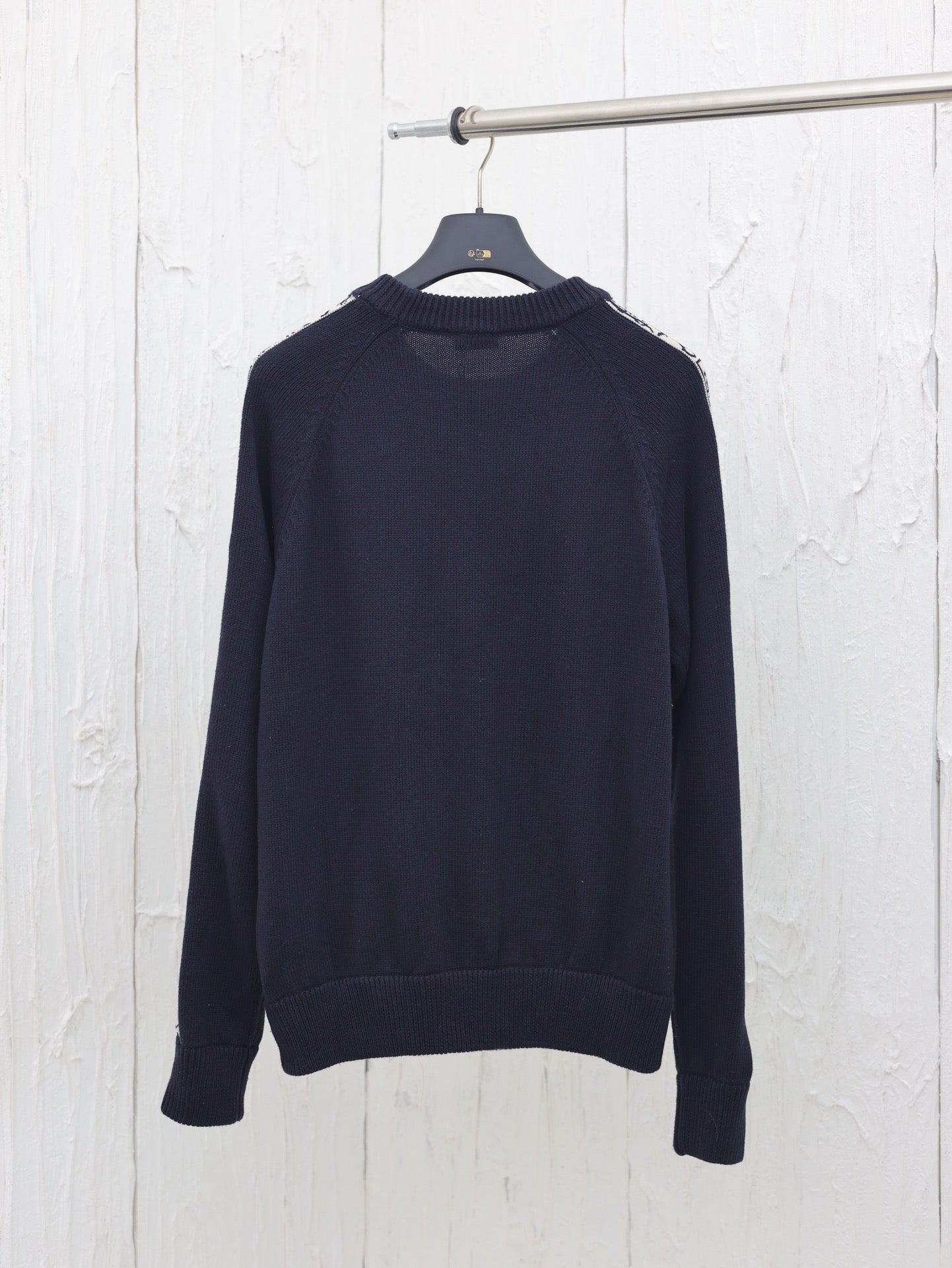 Arm jacquard web crew neck sweater