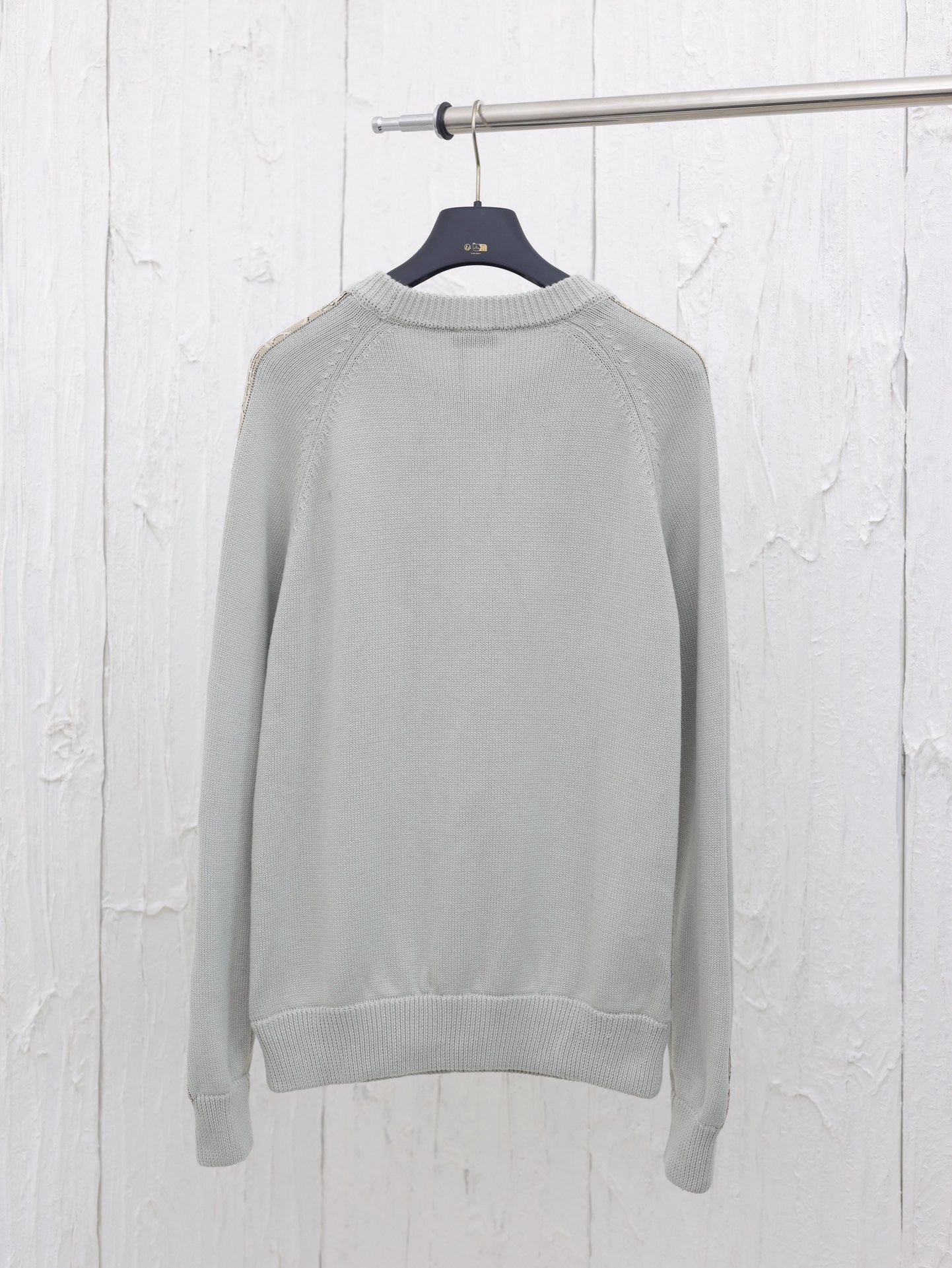 Arm jacquard web crew neck sweater